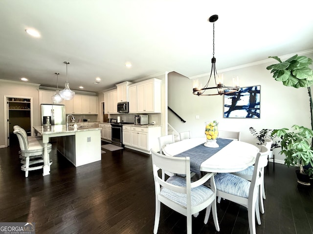 dining area with a chandelier, ornamental molding, recessed lighting, baseboards, and dark wood-style floors