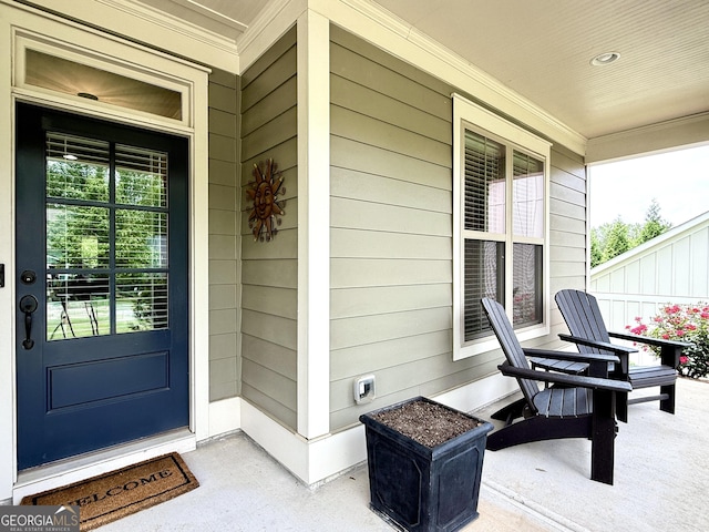 property entrance with a porch