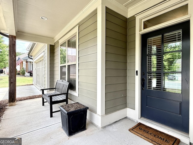 doorway to property with a porch