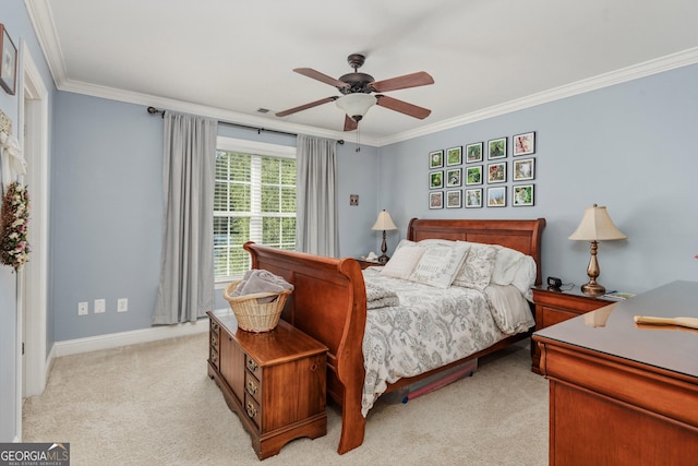 bedroom with light colored carpet, ornamental molding, baseboards, and ceiling fan
