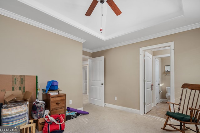 rec room with carpet floors, ornamental molding, baseboards, and ceiling fan