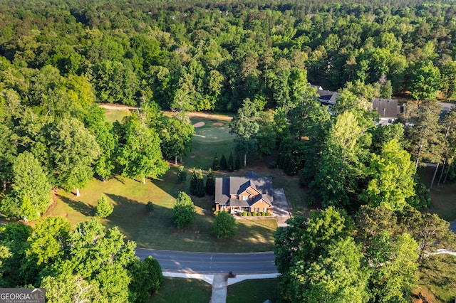 bird's eye view featuring a forest view