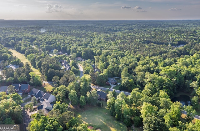 bird's eye view featuring a view of trees