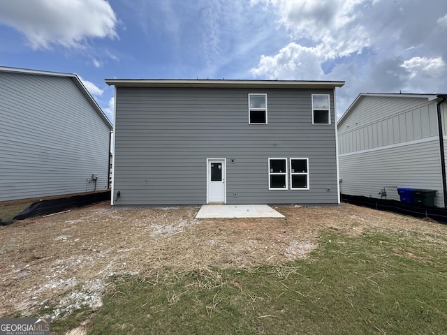1006 Starmoss Ln, Conyers, GA 30094 - rear view of house featuring a patio area and a yard