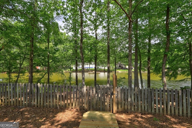 view of water feature featuring fence