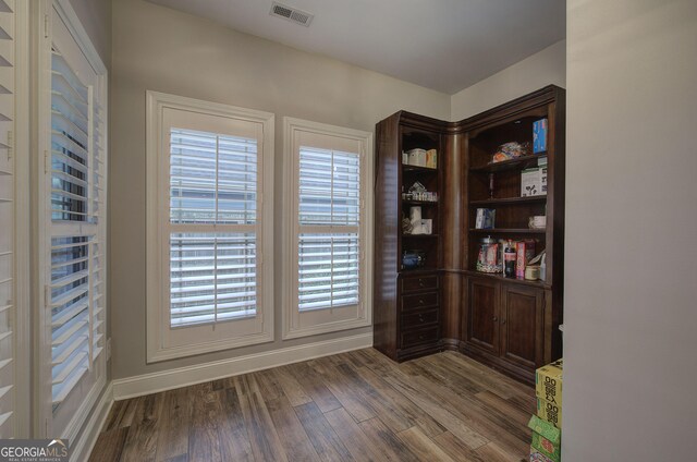57 Round Rock Cir NE, Rome, GA 30161 - spare room featuring visible vents, baseboards, and wood finished floors