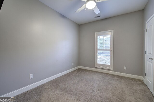 57 Round Rock Cir NE, Rome, GA 30161 - carpeted empty room featuring baseboards, visible vents, and ceiling fan