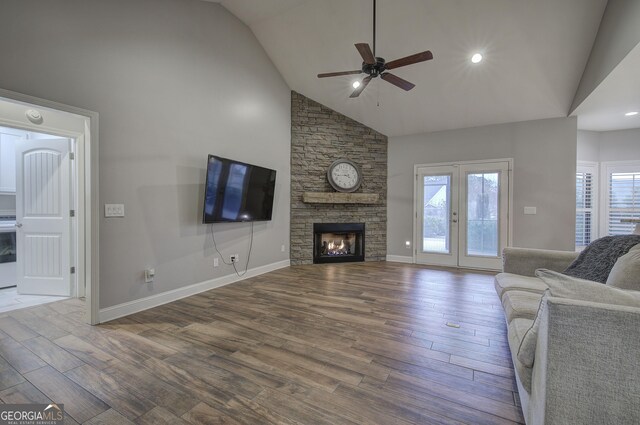57 Round Rock Cir NE, Rome, GA 30161 - living area with a fireplace, high vaulted ceiling, a ceiling fan, baseboards, and wood finished floors