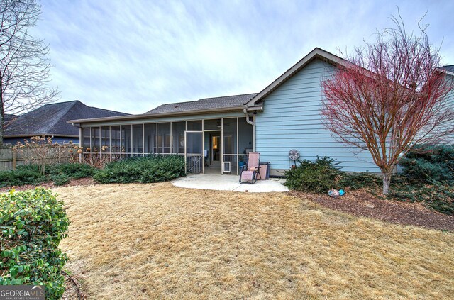 57 Round Rock Cir NE, Rome, GA 30161 - rear view of property featuring a sunroom, fence, and a patio
