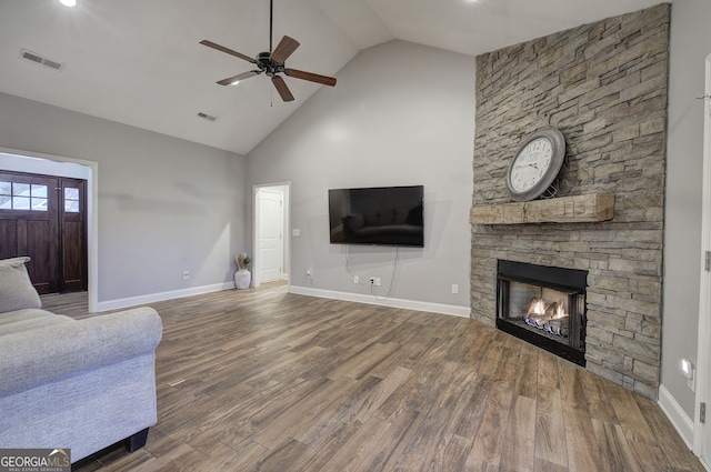57 Round Rock Cir NE, Rome, GA 30161 - living area with ceiling fan, a stone fireplace, baseboards, wood finished floors, and visible vents