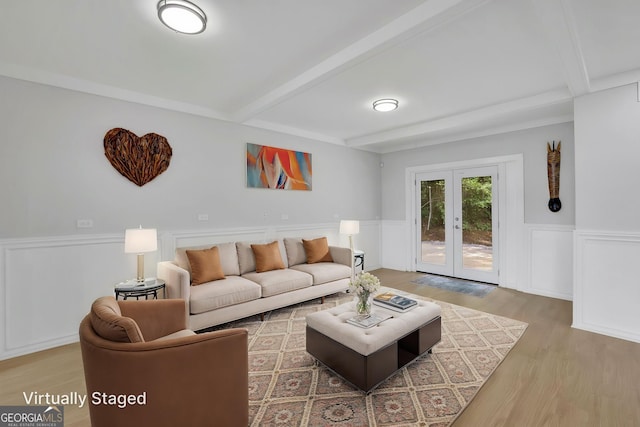 1839 Belcher Pl, Austell, GA 30168 - unfurnished living room featuring recessed lighting, a wainscoted wall, french doors, and light wood-type flooring