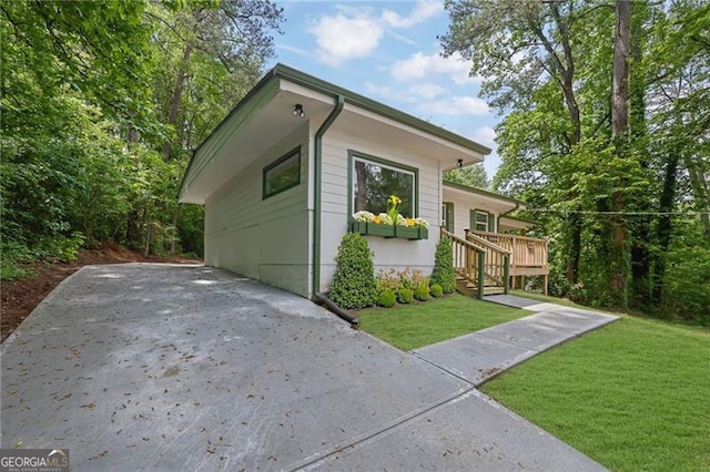 1839 Belcher Pl, Austell, GA 30168 - view of side of home with a lawn and a deck