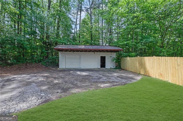 1839 Belcher Pl, Austell, GA 30168 - exterior space with metal roof, a yard, and concrete driveway