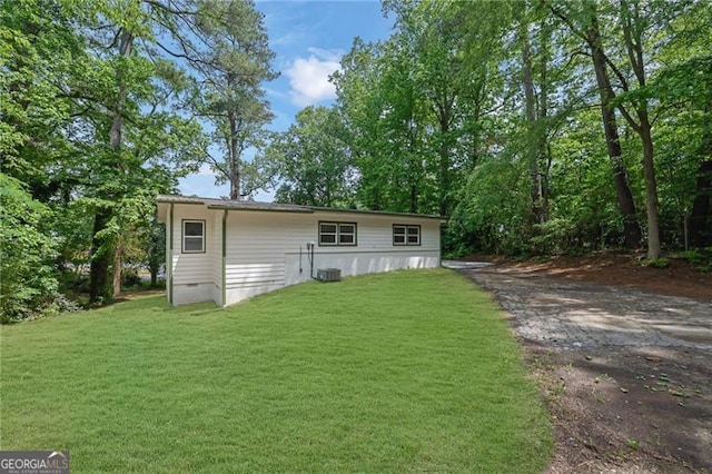 1839 Belcher Pl, Austell, GA 30168 - rear view of house with a yard, driveway, crawl space, and cooling unit