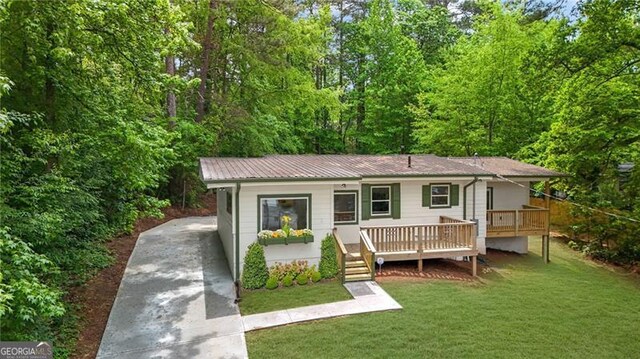 1839 Belcher Pl, Austell, GA 30168 - exterior space with metal roof, a yard, and concrete driveway