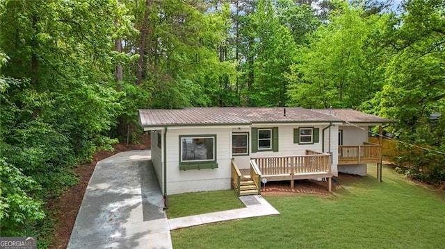 1839 Belcher Pl, Austell, GA 30168 - exterior space featuring a lawn, driveway, and metal roof
