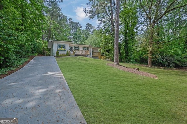 1839 Belcher Pl, Austell, GA 30168 - split foyer home featuring driveway, a deck, and a front yard