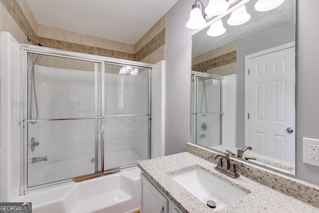 1094 Plantation Ct, Villa Rica, GA 30180 - bathroom featuring enclosed tub / shower combo and vanity