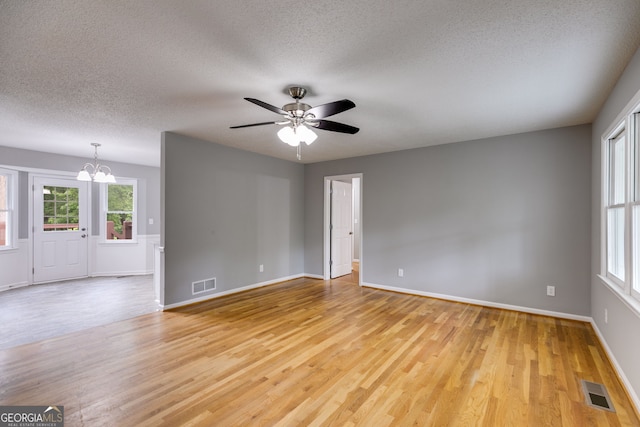 1094 Plantation Ct, Villa Rica, GA 30180 - empty room featuring a textured ceiling, light wood-style flooring, and visible vents