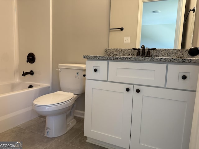 788 Traveler Ln, Williamson, GA 30292 - bathroom with bathtub / shower combination, tile patterned floors, baseboards, vanity, and toilet