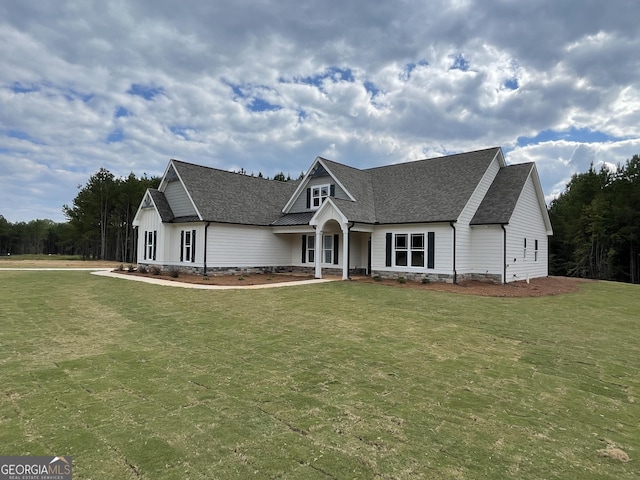 788 Traveler Ln, Williamson, GA 30292 - modern inspired farmhouse with a shingled roof and a front yard