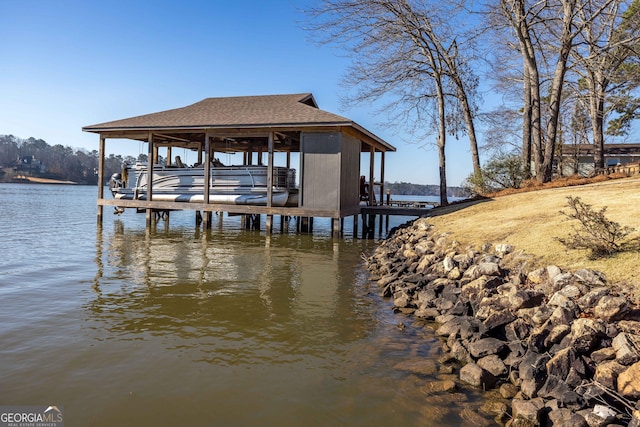 view of dock with a water view and boat lift