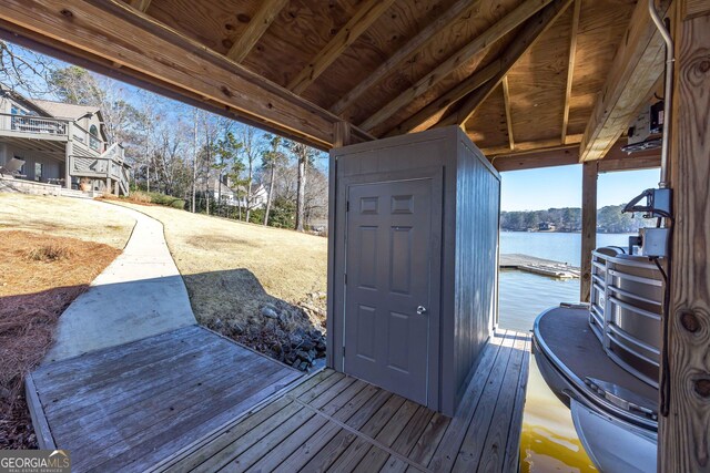 302 Odom Dr, Hamilton, GA 31811 - wooden deck with a water view and a dock