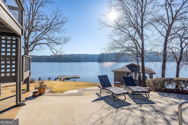 302 Odom Dr, Hamilton, GA 31811 - view of patio with a water view and a boat dock