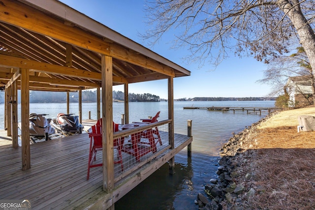 view of dock with a water view and boat lift