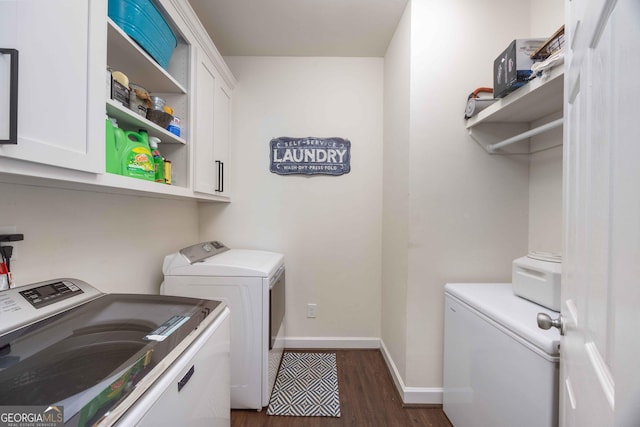 302 Odom Dr, Hamilton, GA 31811 - laundry area with washing machine and dryer, cabinet space, dark wood-style flooring, and baseboards