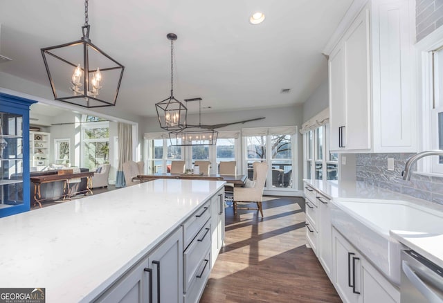 302 Odom Dr, Hamilton, GA 31811 - kitchen featuring a chandelier, a sink, healthy amount of natural light, dark wood-type flooring, and recessed lighting