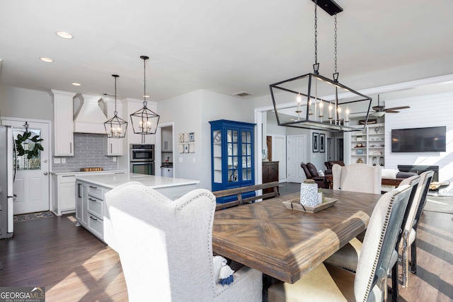 302 Odom Dr, Hamilton, GA 31811 - dining area featuring a chandelier, a ceiling fan, recessed lighting, and dark wood-type flooring