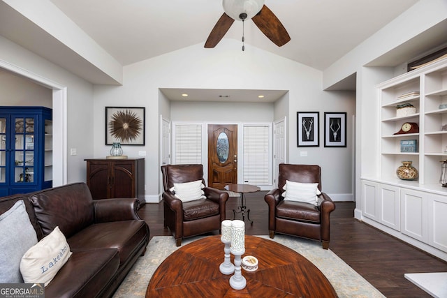 302 Odom Dr, Hamilton, GA 31811 - living room with dark wood-style flooring, baseboards, ceiling fan, and built in shelves