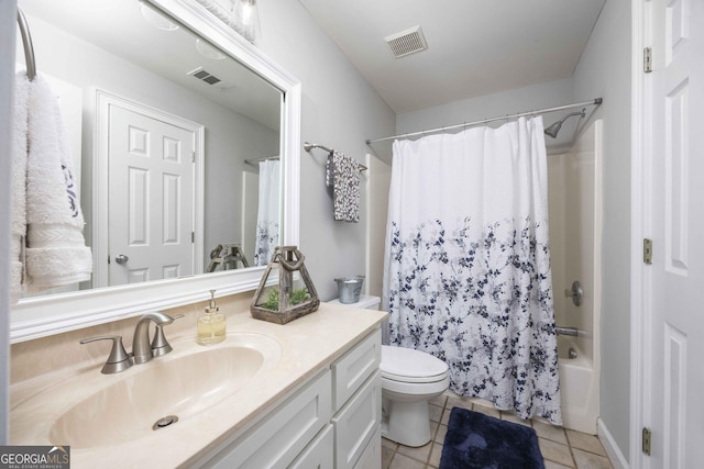 302 Odom Dr, Hamilton, GA 31811 - full bath with tile patterned floors, vanity, toilet, and shower / tub combo with curtain