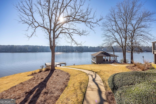 property view of water featuring a boat dock and boat lift