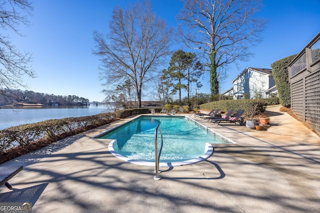 302 Odom Dr, Hamilton, GA 31811 - swimming pool with a patio area and a water view