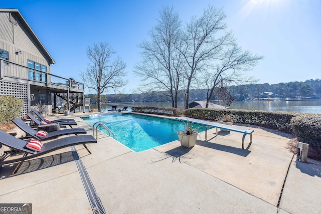 302 Odom Dr, Hamilton, GA 31811 - outdoor pool with stairs, a patio area, and a deck with water view