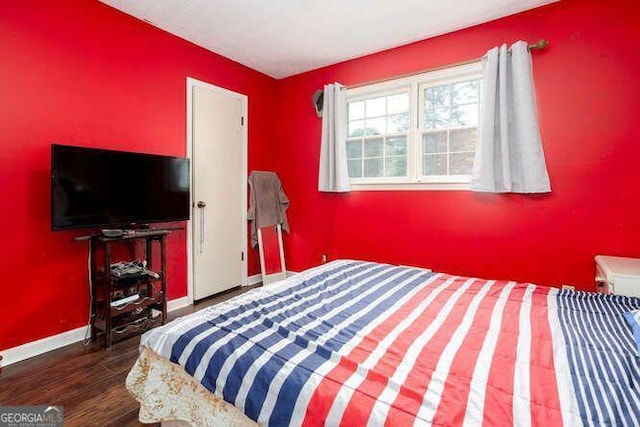 4812 Pamela Ct, Acworth, GA 30101 - bedroom with baseboards and wood finished floors
