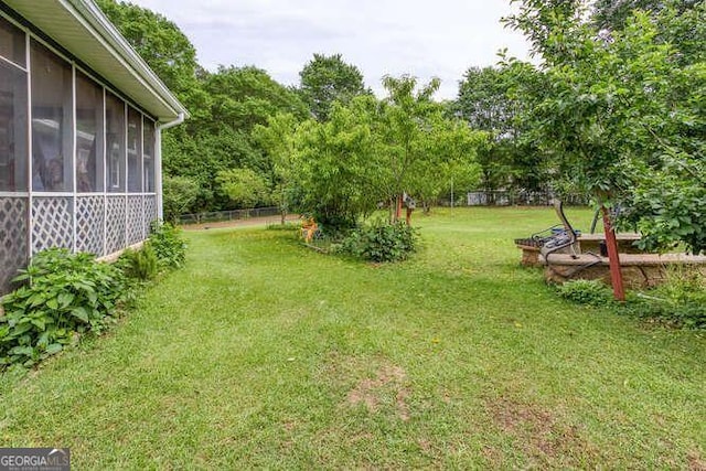 4812 Pamela Ct, Acworth, GA 30101 - view of yard featuring fence and a sunroom