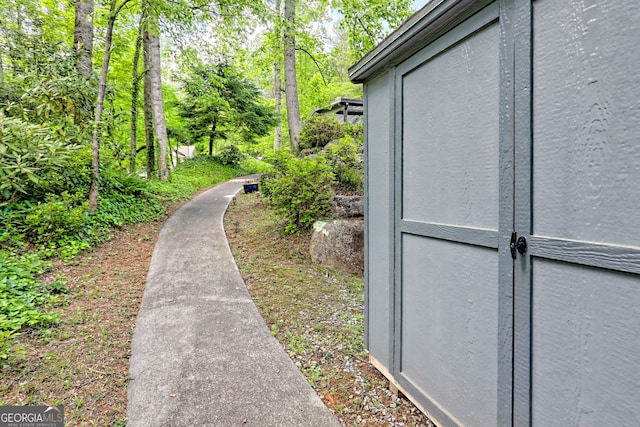 view of home's exterior featuring an outdoor structure