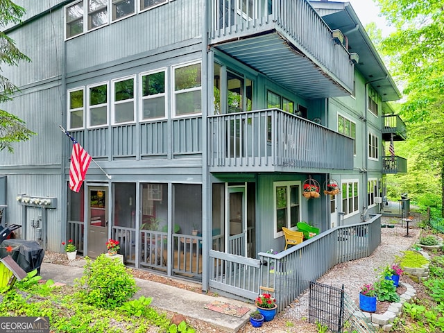 230 Stornoway Dr Unit 1, Clayton, GA 30525 - rear view of property featuring a balcony