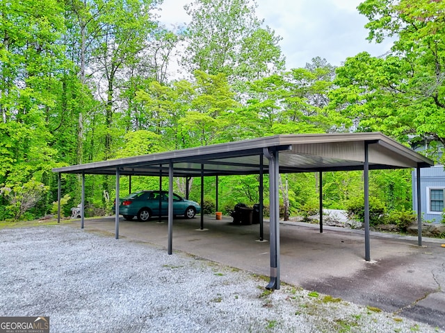 230 Stornoway Dr Unit 1, Clayton, GA 30525 - view of parking / parking lot featuring a carport