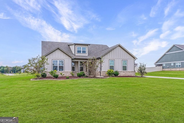 112 Leveret Rd, Locust Grove, GA 30248 - craftsman-style home with a shingled roof, board and batten siding, and a front lawn