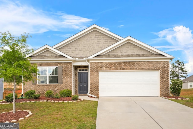 138 Yonah Way, Dallas, GA 30132 - craftsman inspired home with concrete driveway, a front lawn, brick siding, and an attached garage