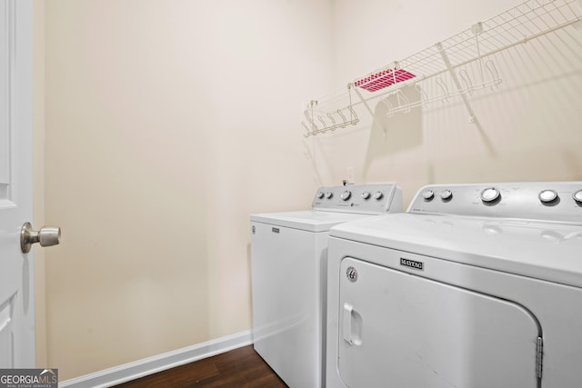 138 Yonah Way, Dallas, GA 30132 - laundry room with washing machine and dryer, baseboards, and dark wood-type flooring