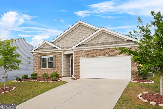 138 Yonah Way, Dallas, GA 30132 - craftsman house featuring driveway, a front yard, brick siding, and an attached garage