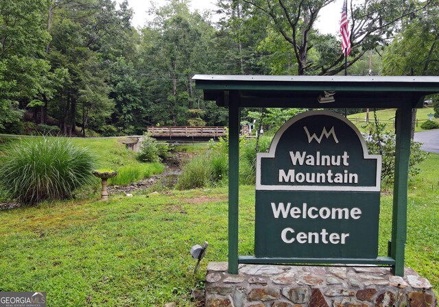 66 Pine Ridge Ct, Ellijay, GA 30536 - community / neighborhood sign featuring a lawn