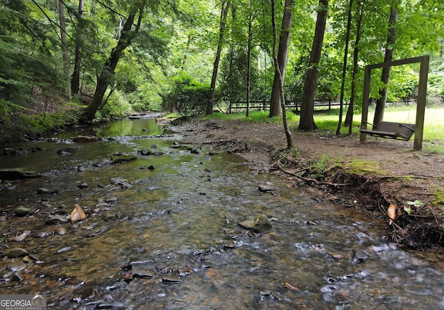 view of landscape with a view of trees