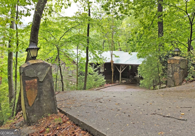 exterior space with metal roof