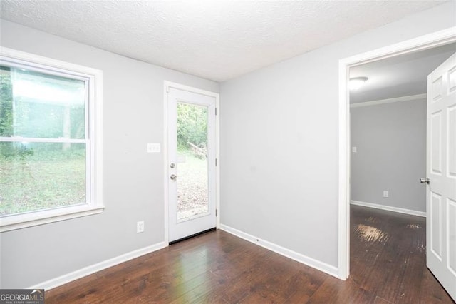 2607 Jefferson Ter, Atlanta, GA 30344 - entryway featuring wood-type flooring and a textured ceiling